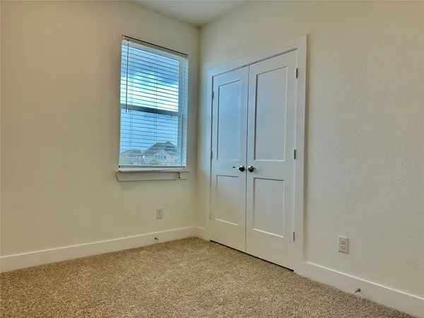 a bathroom with a granite countertop sink toilet bathtub and shower