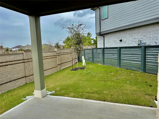a view of a porch with furniture