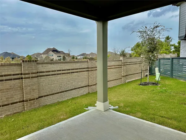 a view of a porch with furniture