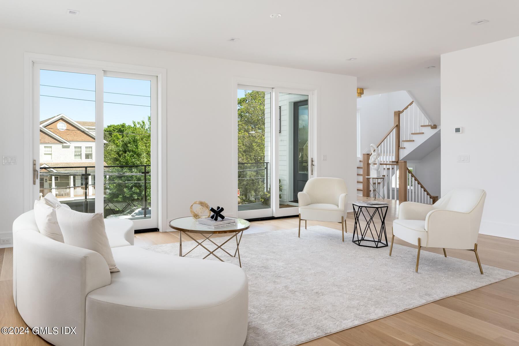 151 East Elm Street Greenwich, CT 06830 - Photo 3 of 29 a living room with furniture and a large window