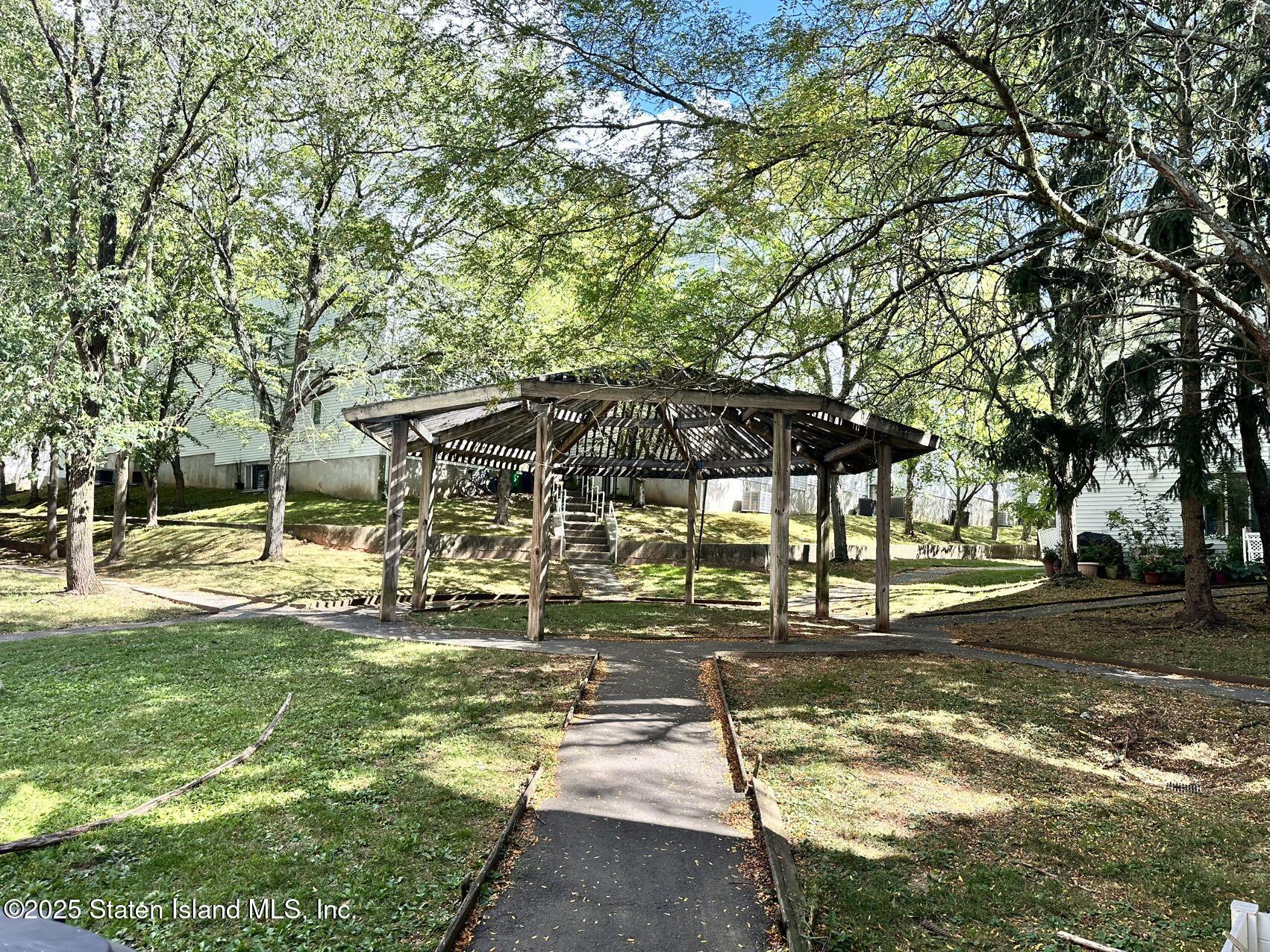 453 Ilyssa Way Staten Island, NY 10312 - Photo 15 of 16 a view of a swimming pool with a patio