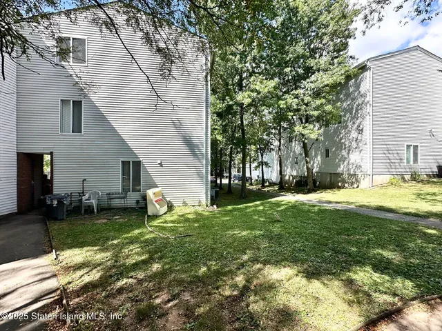a view of a backyard with a garden