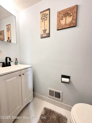 a bathroom with a toilet and a sink