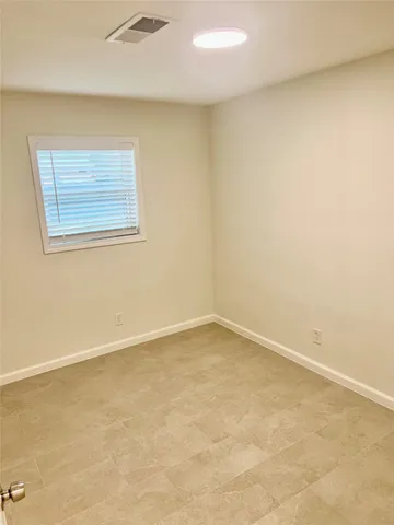 an empty room with a natural light