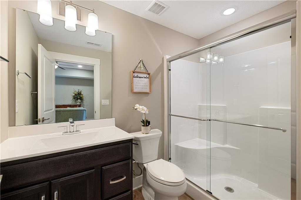 312 High Pointe Drive Seven Fields, PA 16046 - Photo 23 of 25 a bathroom with a sink a toilet and shower