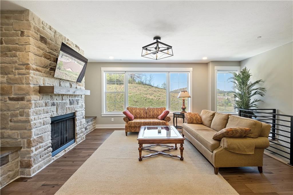 312 High Pointe Drive Seven Fields, PA 16046 - Photo 5 of 25 a living room with furniture fireplace and window