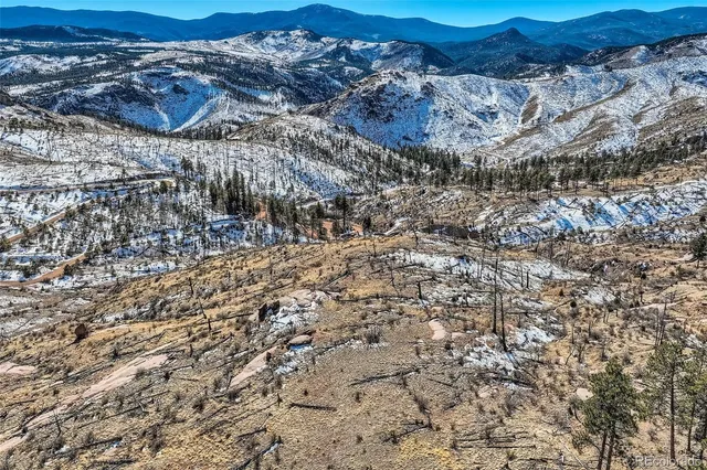 a view of a house with a mountain
