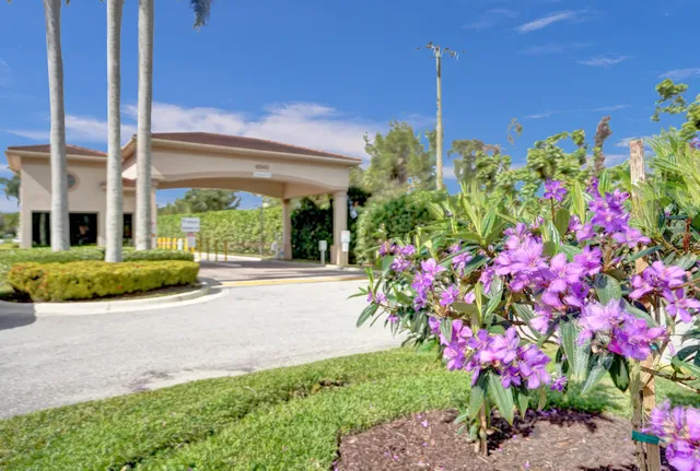 a flower garden in front of a building
