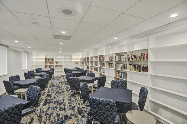 a view of a street in front of a building