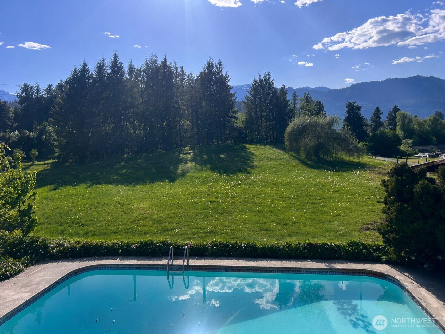 9656 North Road Peshastin, WA 98847 - Photo 1 of 40 a view of a golf course with a yard