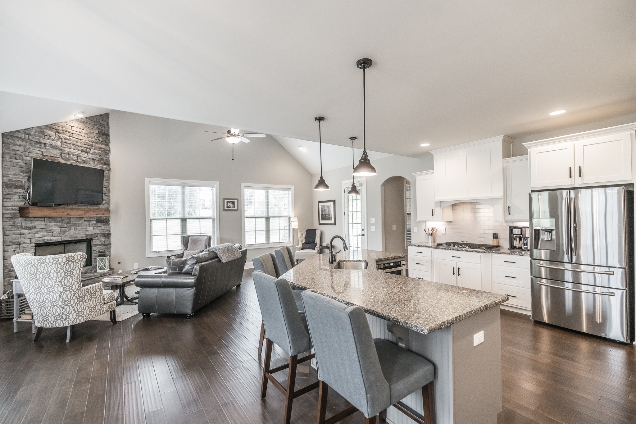 1395 Center Point Road Hendersonville, TN 37075 - Photo 12 of 50 a large kitchen with sink a refrigerator and chairs