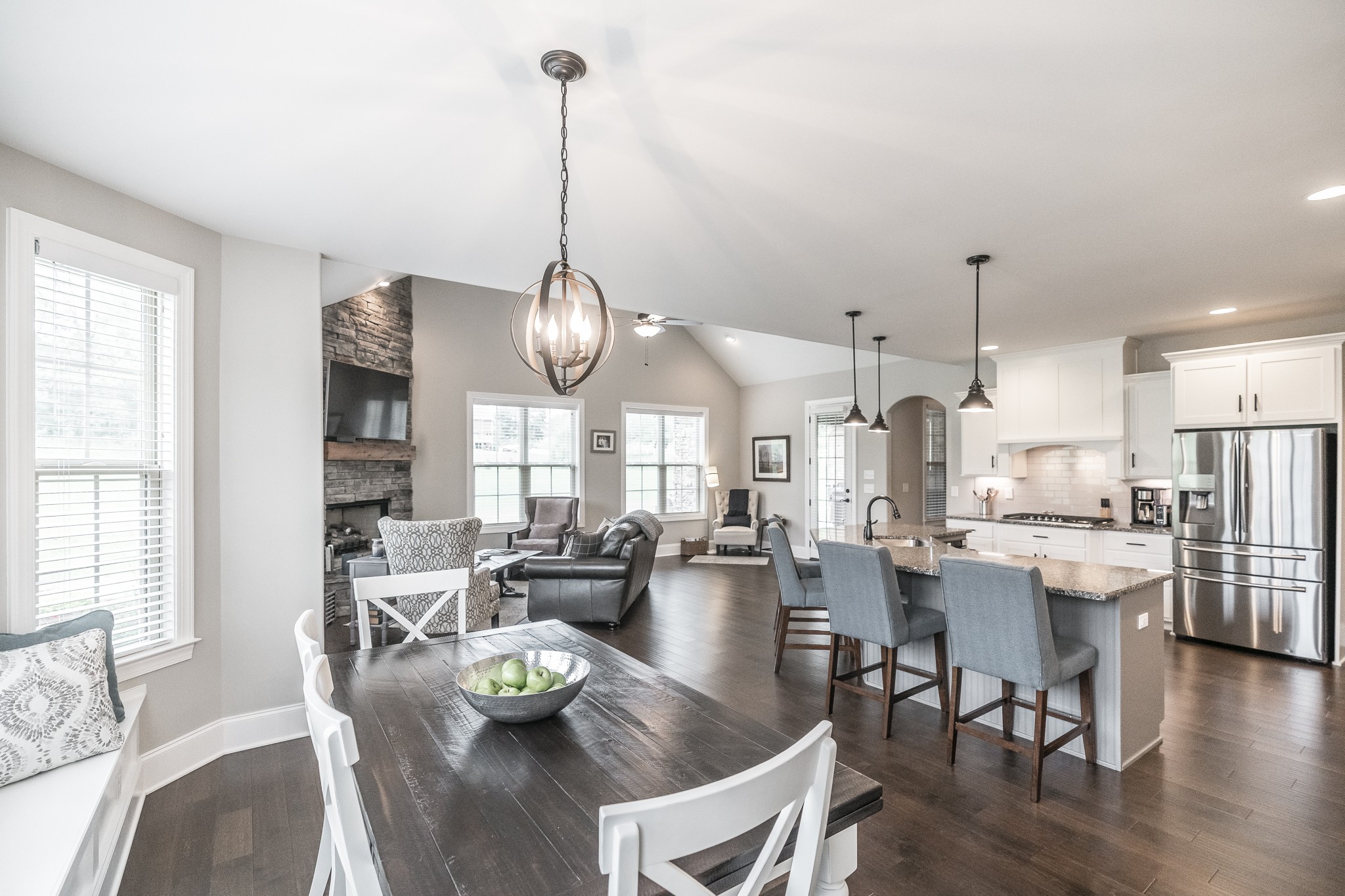 1395 Center Point Road Hendersonville, TN 37075 - Photo 13 of 50 a view of a dining room and livingroom with furniture wooden floor kitchen chandelier