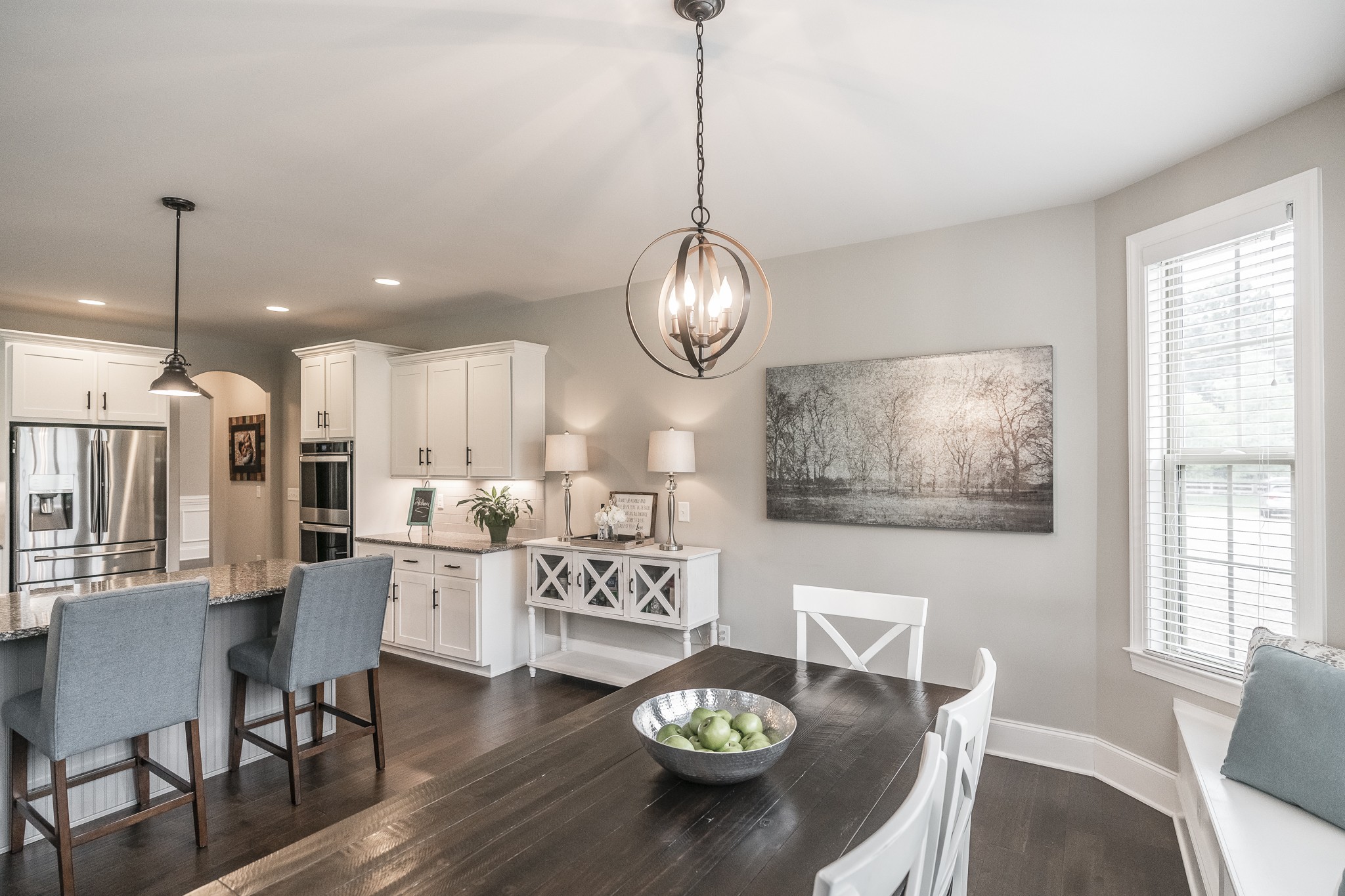 1395 Center Point Road Hendersonville, TN 37075 - Photo 16 of 50 a view of a dining room with furniture a chandelier and wooden floor