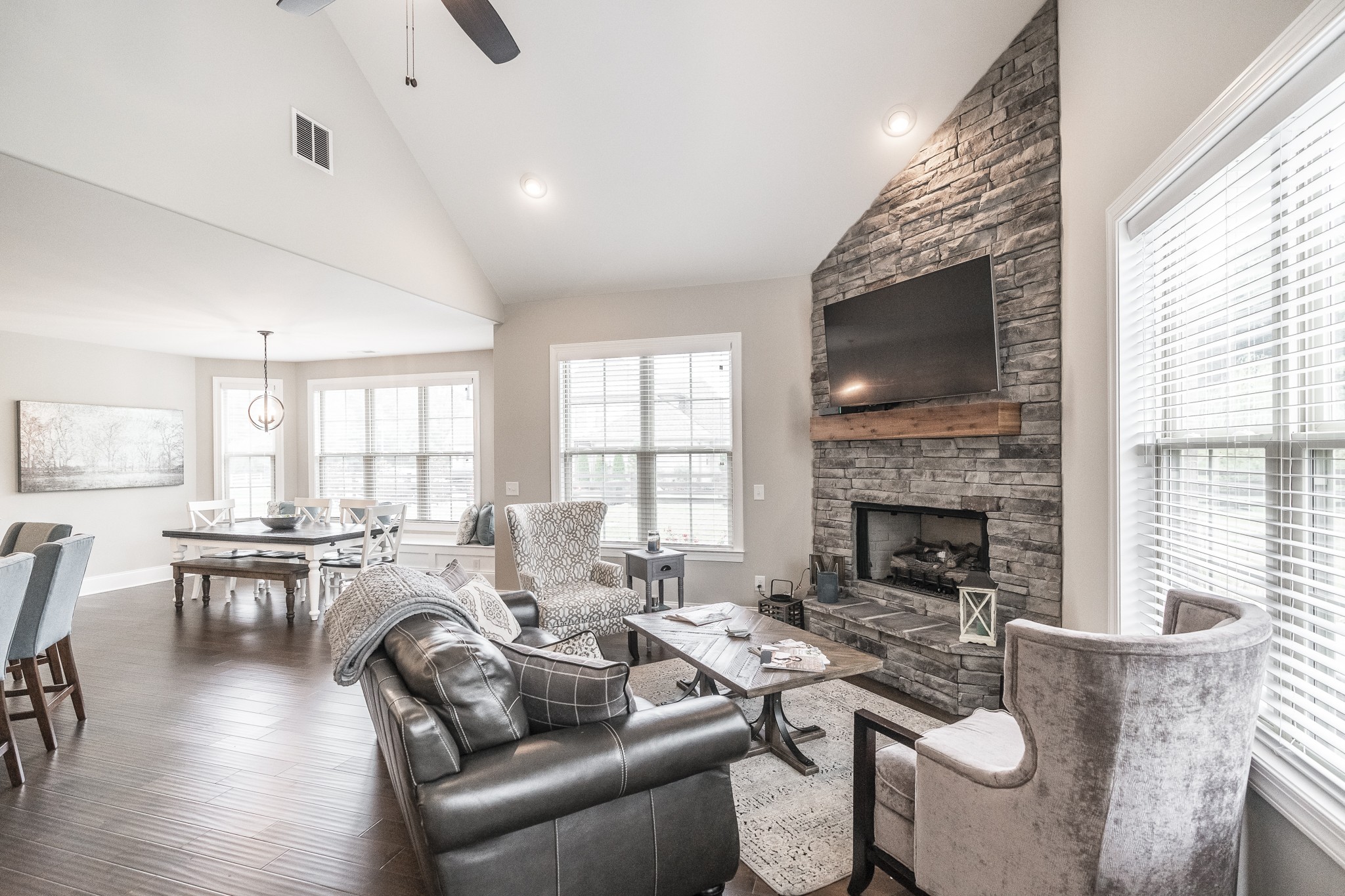 1395 Center Point Road Hendersonville, TN 37075 - Photo 17 of 50 a living room with furniture a flat screen tv and a fireplace