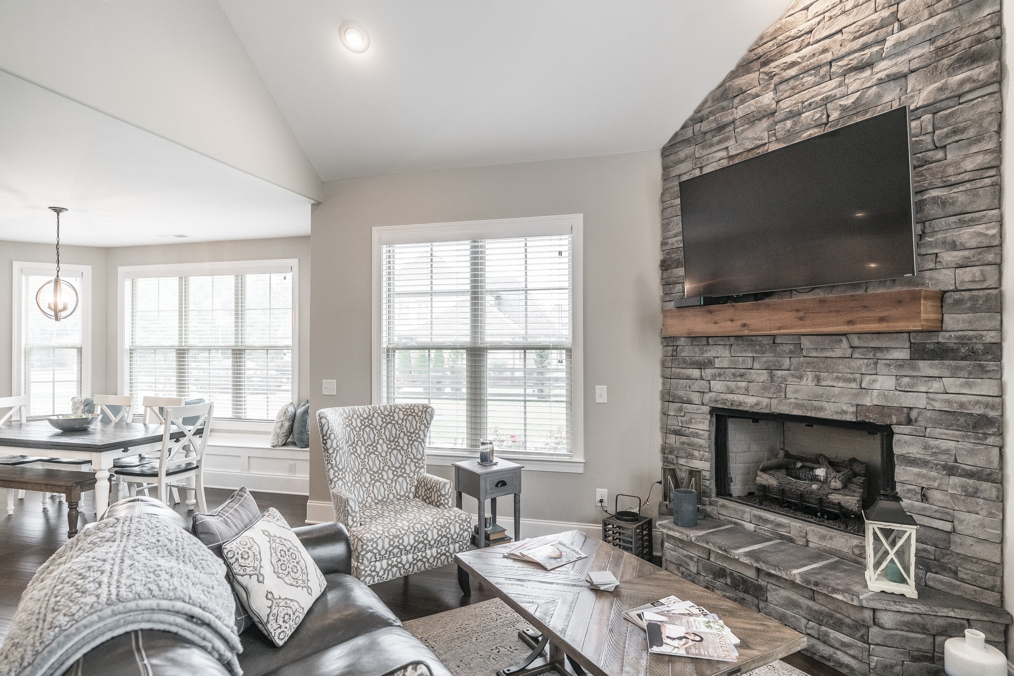 1395 Center Point Road Hendersonville, TN 37075 - Photo 19 of 50 a living room with furniture a flat screen tv and a fireplace