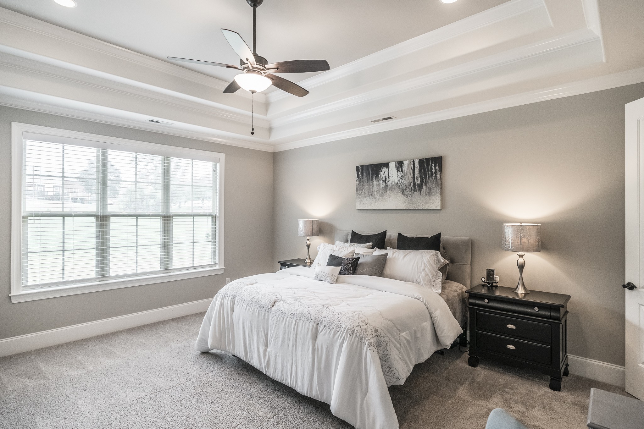 1395 Center Point Road Hendersonville, TN 37075 - Photo 29 of 50 a spacious bedroom with a bed a dresser and a large window