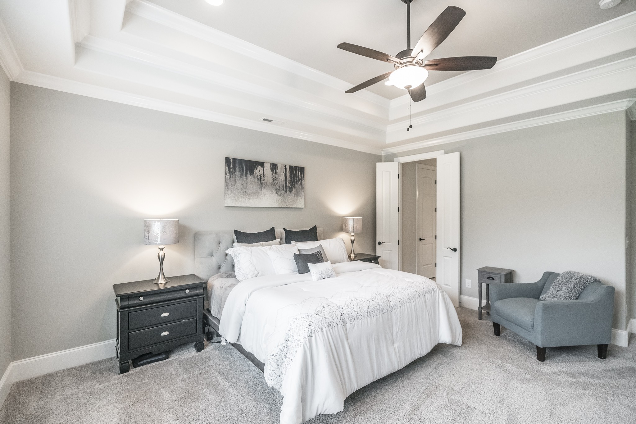 1395 Center Point Road Hendersonville, TN 37075 - Photo 30 of 50 a bedroom with bed and a chandelier