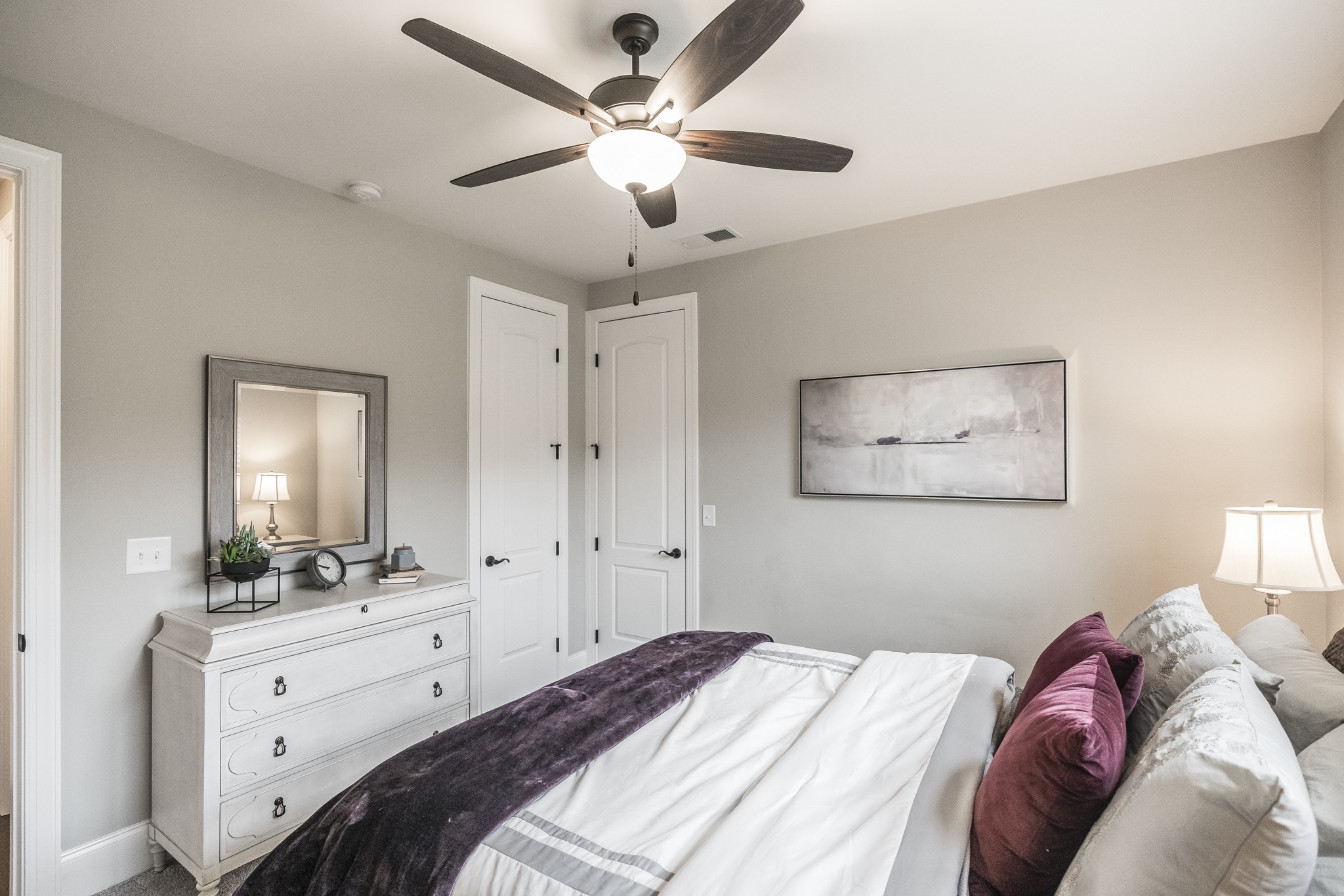1395 Center Point Road Hendersonville, TN 37075 - Photo 35 of 50 a bedroom with a large bed and a chandelier
