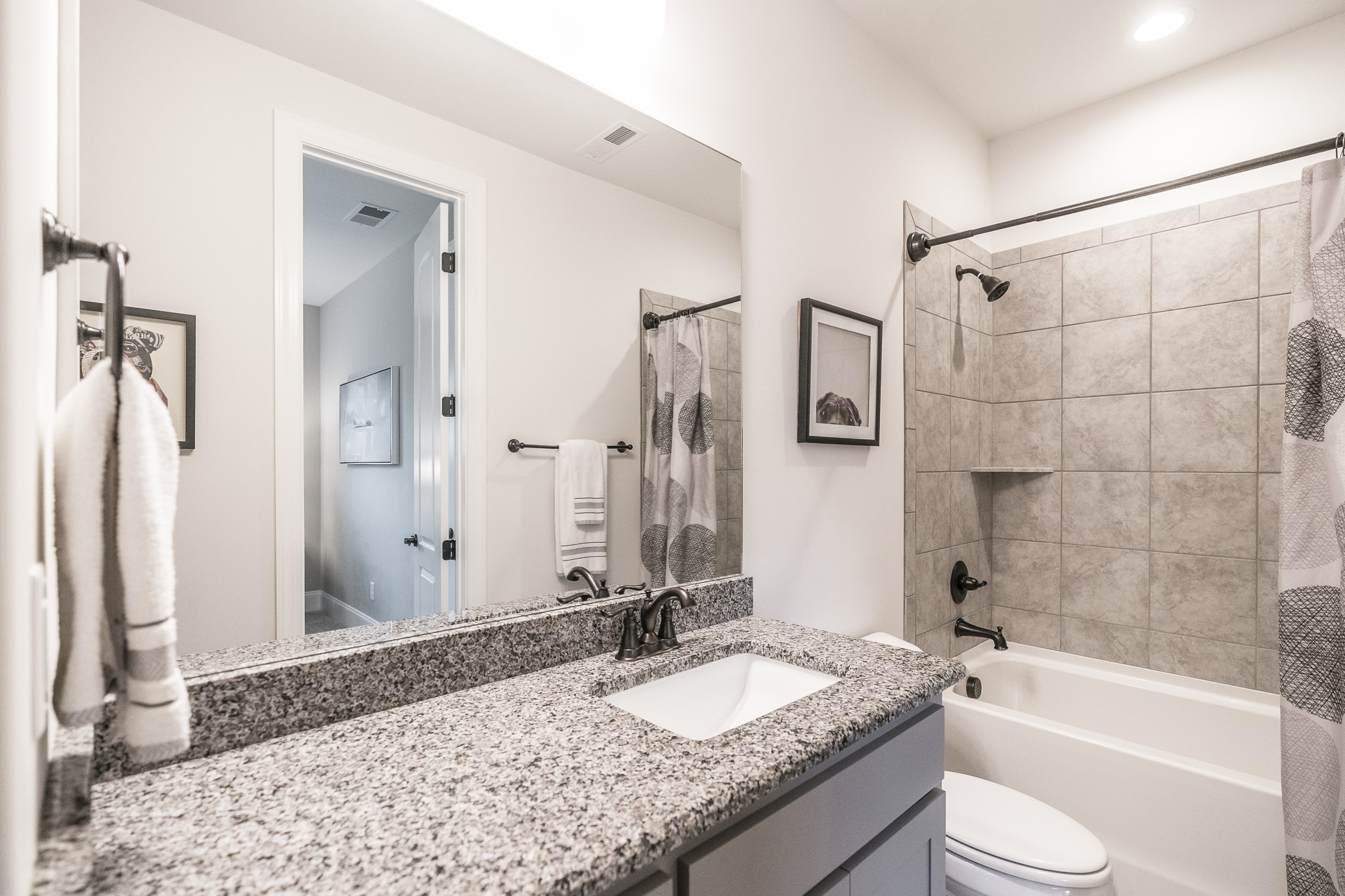 1395 Center Point Road Hendersonville, TN 37075 - Photo 36 of 50 a bathroom with a granite countertop sink toilet and shower