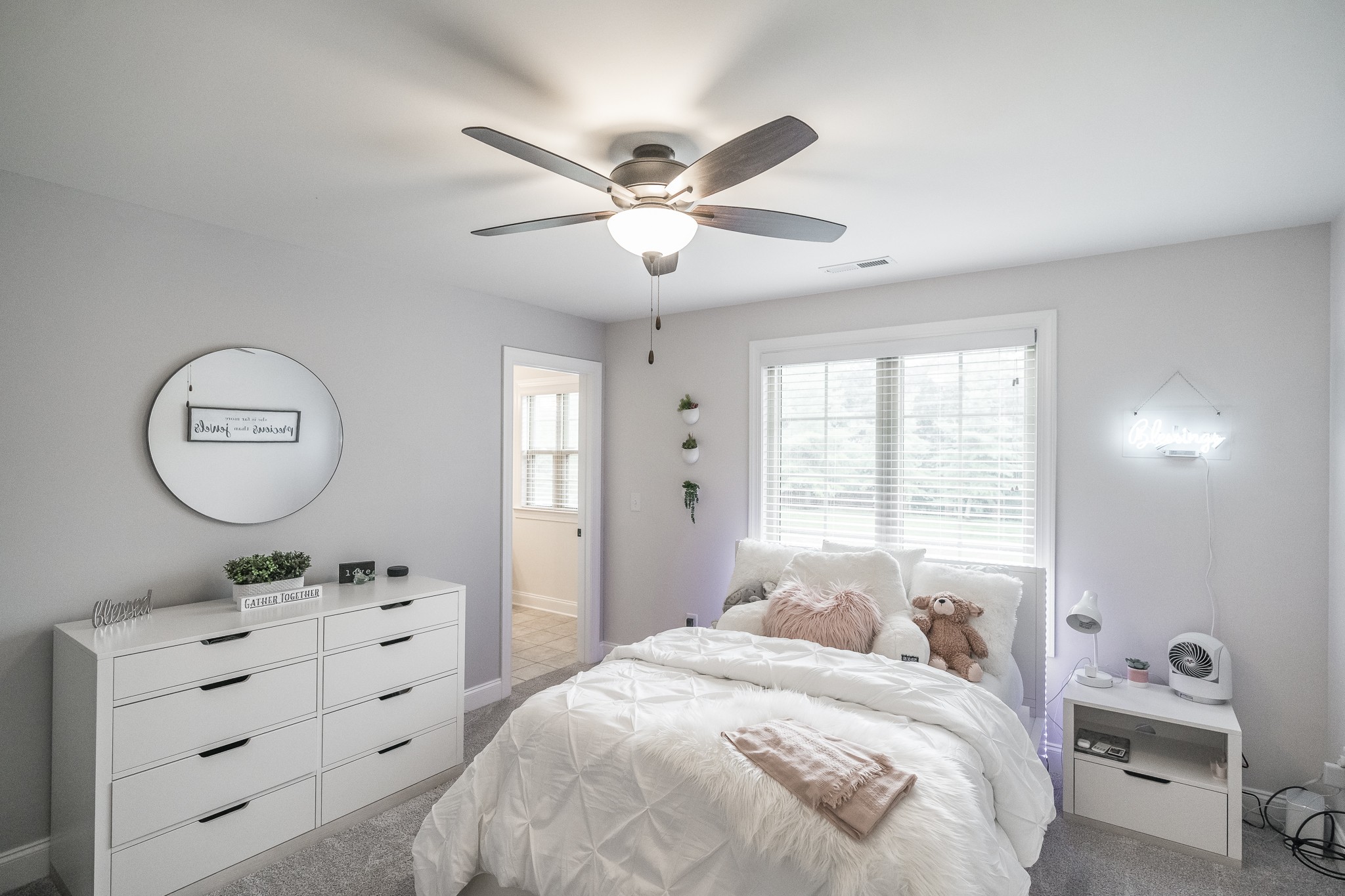 1395 Center Point Road Hendersonville, TN 37075 - Photo 42 of 50 a bedroom with a bed and a chandelier