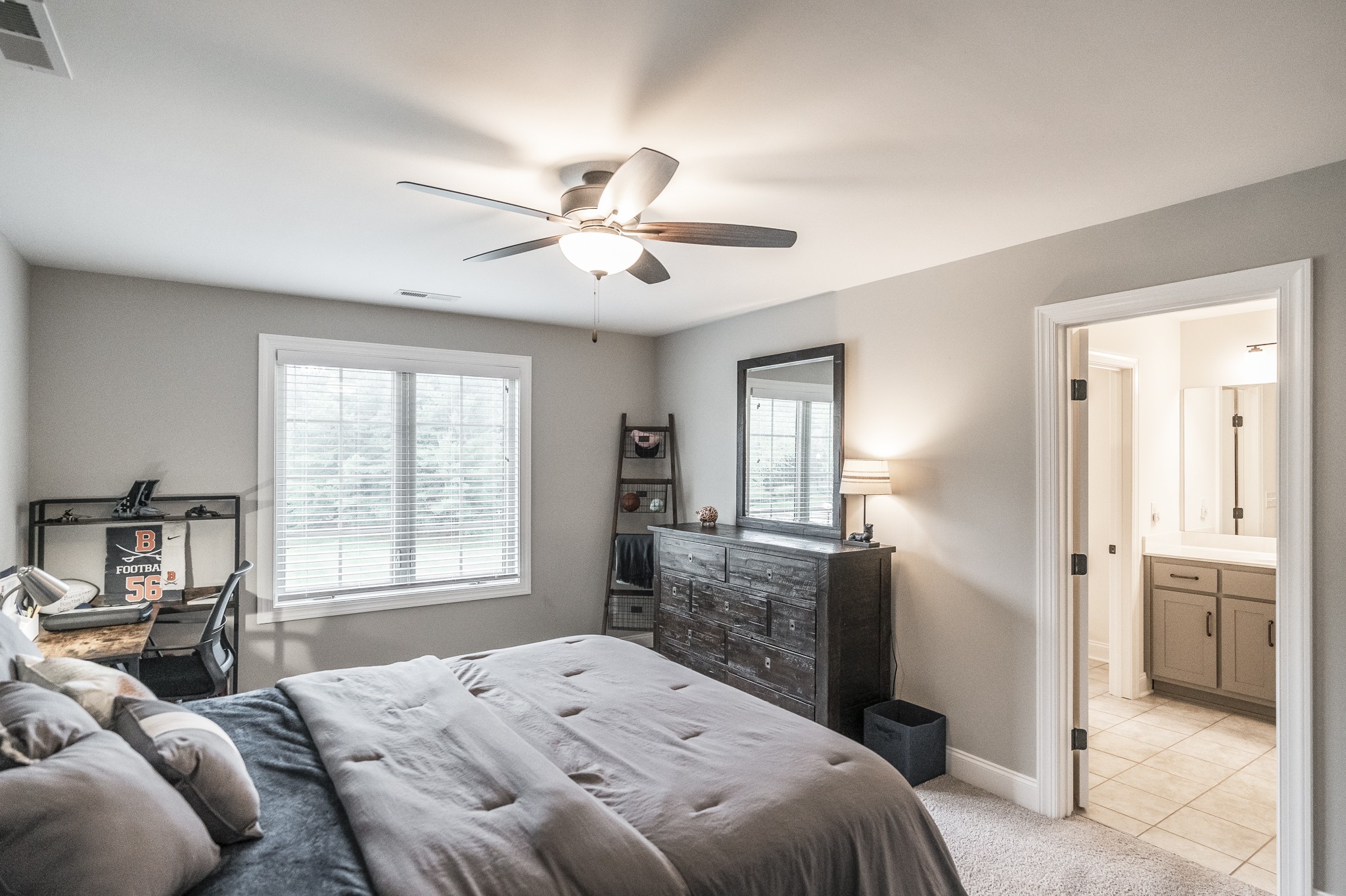 1395 Center Point Road Hendersonville, TN 37075 - Photo 45 of 50 a bedroom with a bed ceiling fan and a window