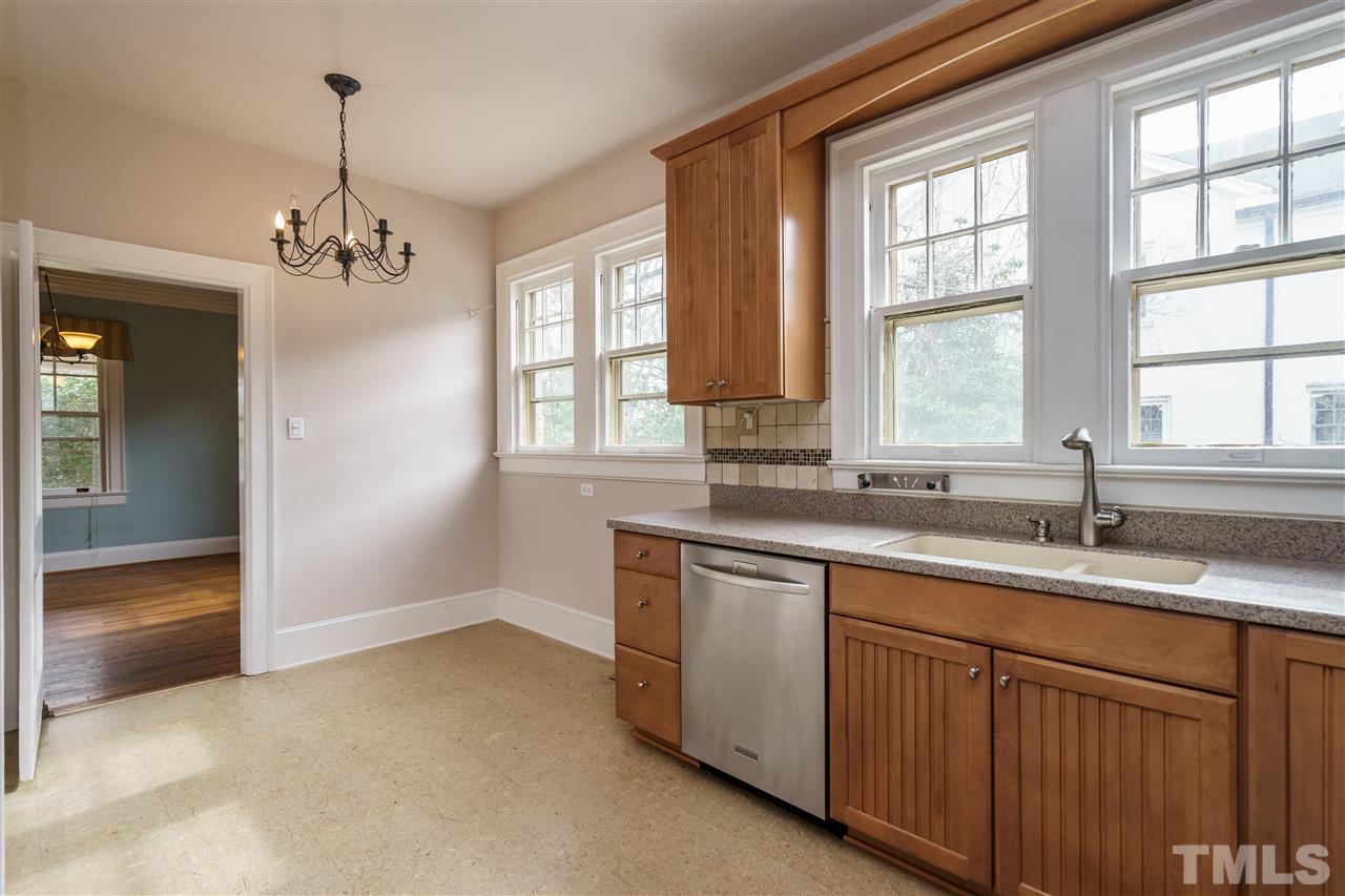 2415 Fairview Road Raleigh, NC 27608 - Photo 8 of 24 a kitchen with sink and window