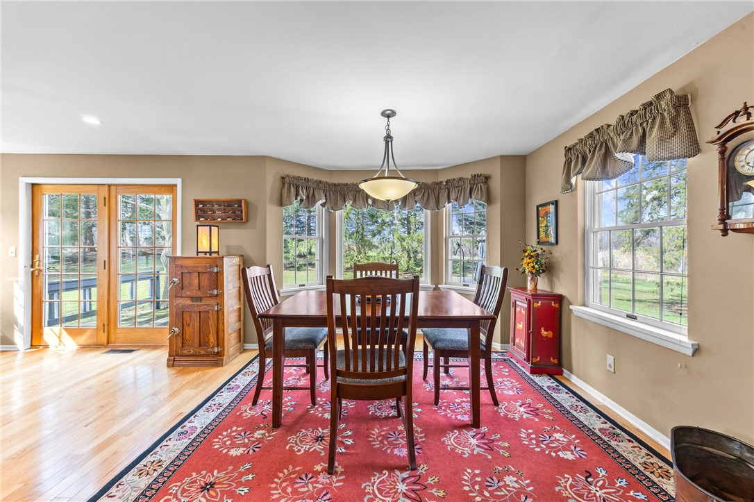 2480 Cooley Road Canandaigua, NY 14424 - Photo 13 of 50 Eat in Area for Kitchen overlooking your private back yard