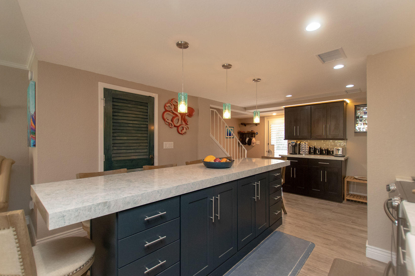 a kitchen with a sink and cabinets