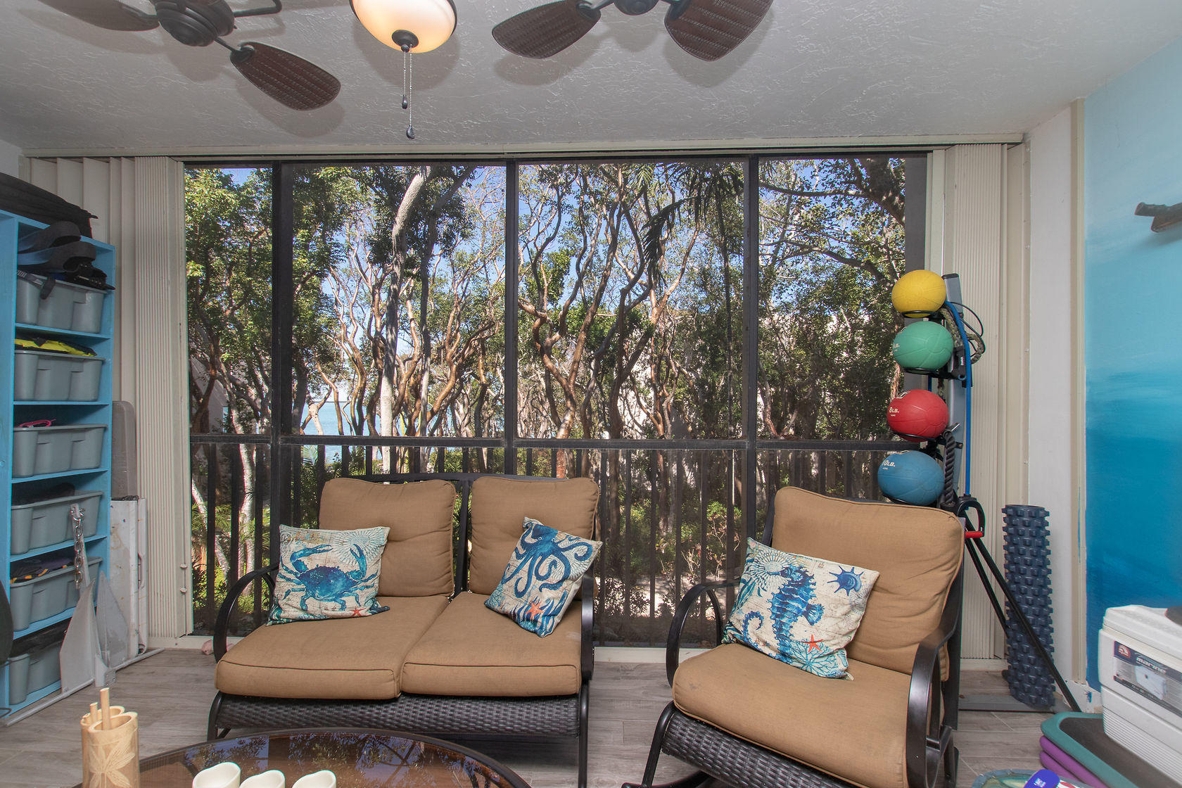 97652 Overseas Highway, Unit M11 Key Largo, FL 33037 - Photo 12 of 48 a living room with furniture and flowers