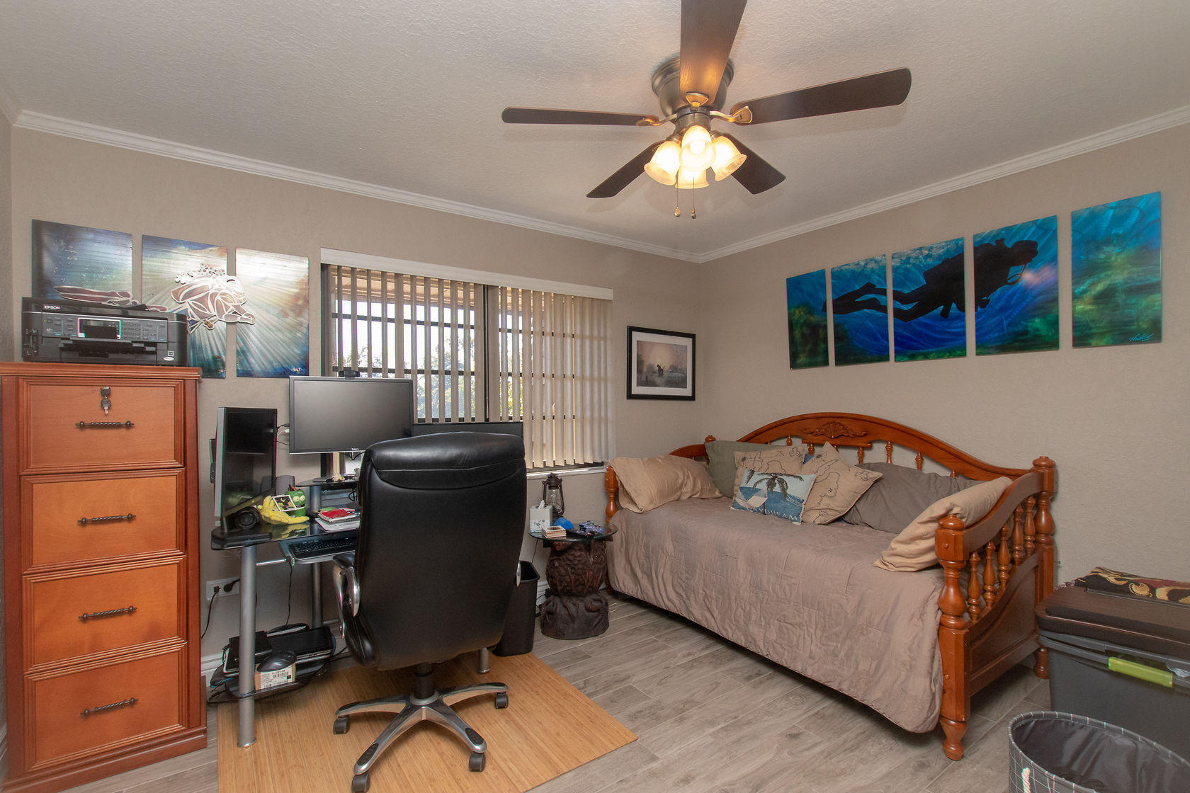 97652 Overseas Highway, Unit M11 Key Largo, FL 33037 - Photo 31 of 48 a living room with furniture and a chandelier