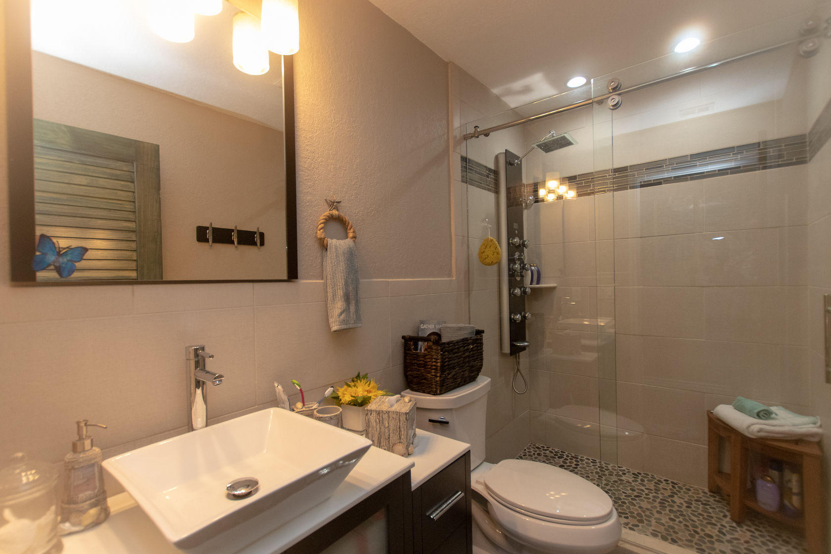 97652 Overseas Highway, Unit M11 Key Largo, FL 33037 - Photo 34 of 48 a bathroom with a sink a toilet and shower