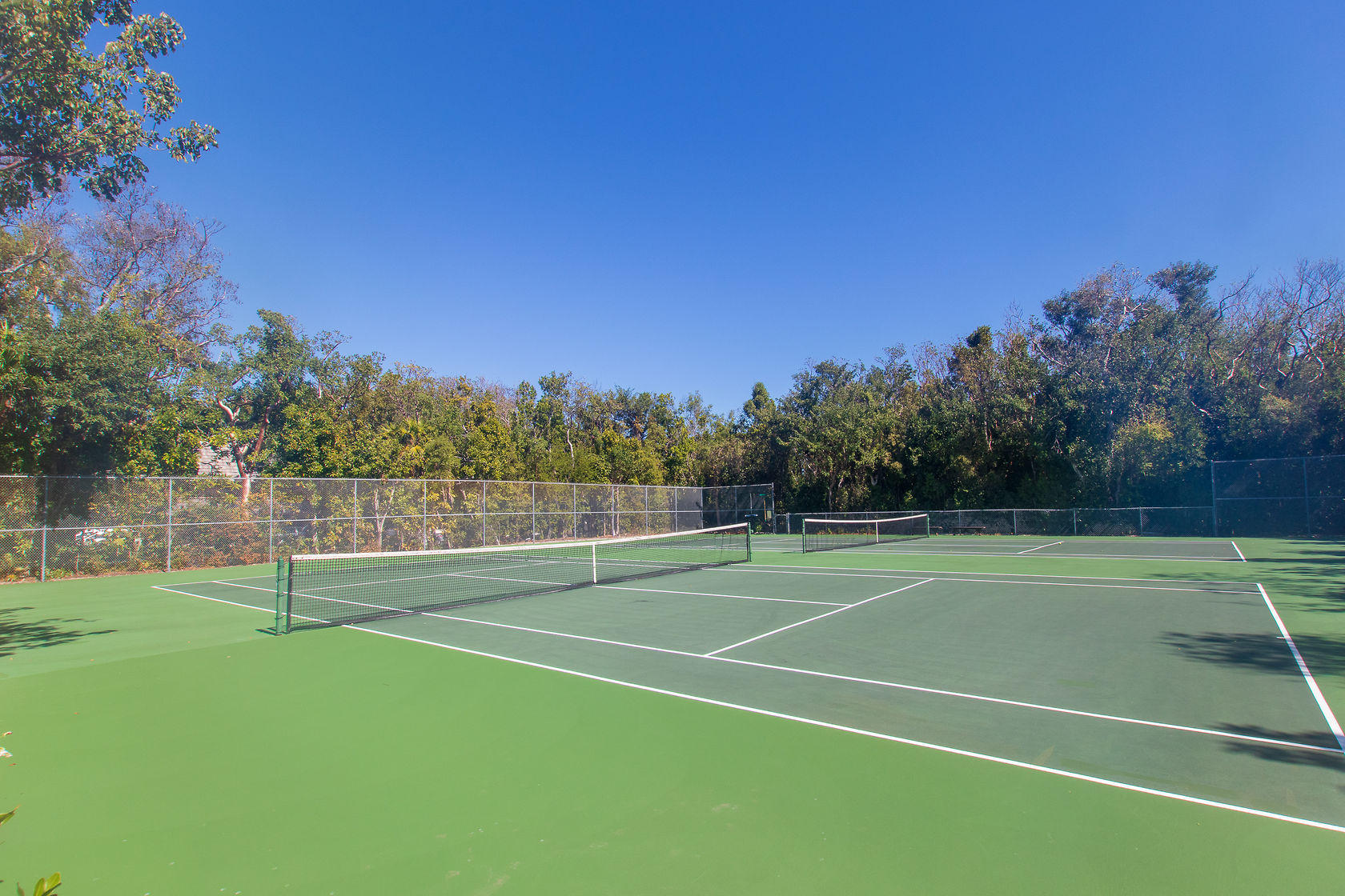 97652 Overseas Highway, Unit M11 Key Largo, FL 33037 - Photo 36 of 48 a view of a tennis court