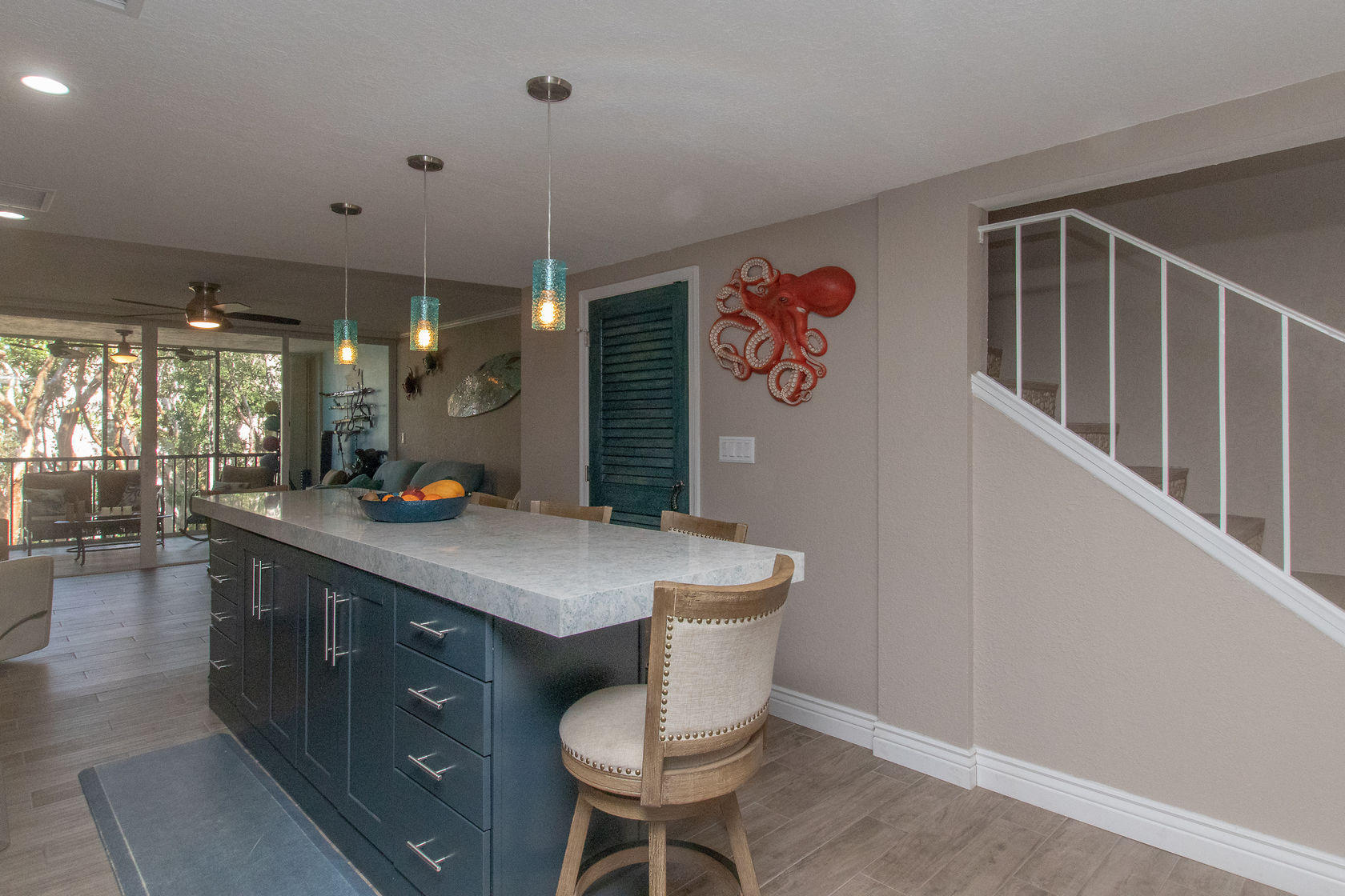 97652 Overseas Highway, Unit M11 Key Largo, FL 33037 - Photo 6 of 48 a kitchen with a table and chairs in it
