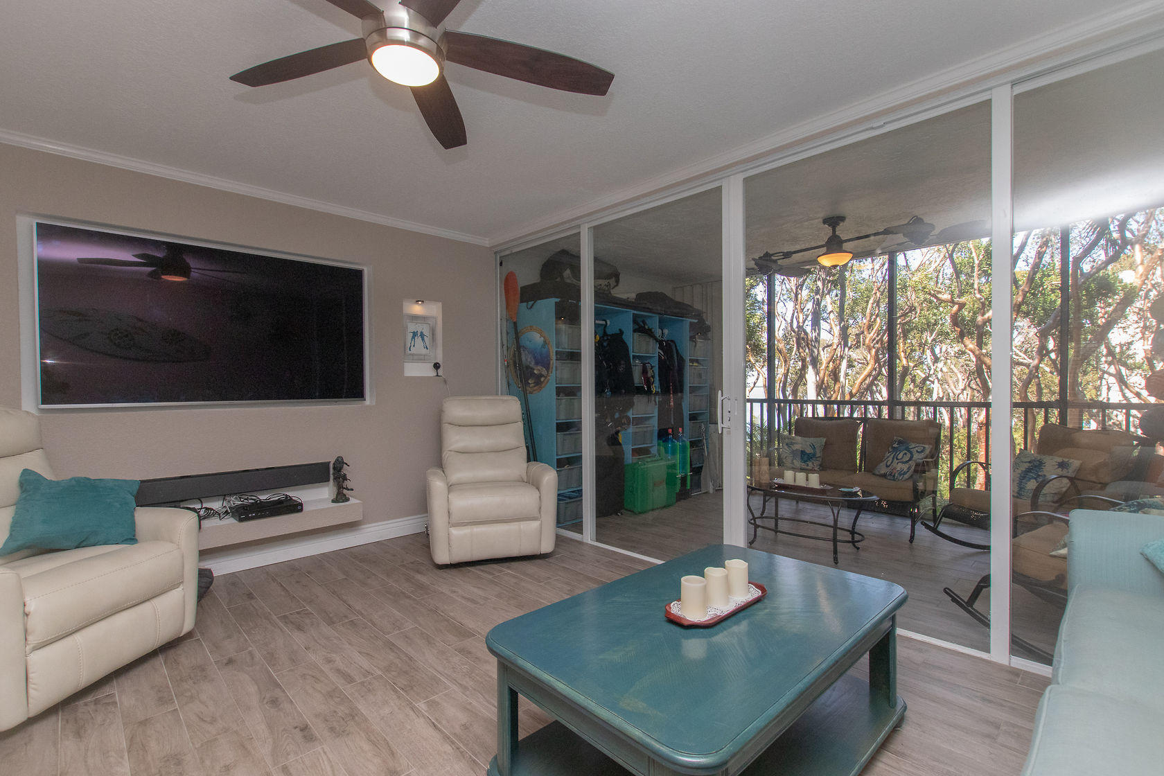97652 Overseas Highway, Unit M11 Key Largo, FL 33037 - Photo 10 of 48 a living room with furniture and a flat screen tv
