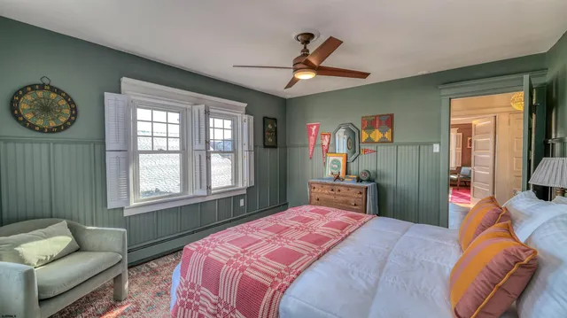 a view of an entryway and wooden floor