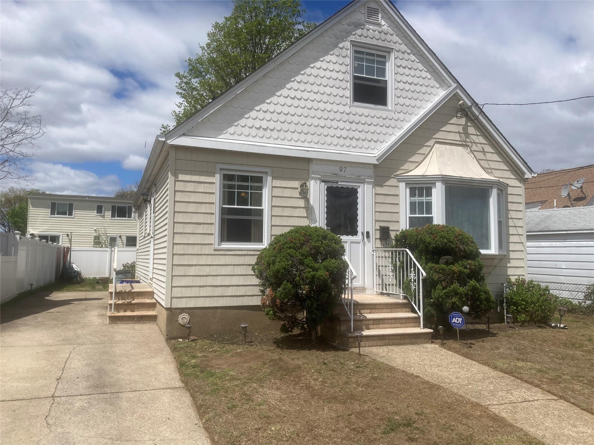 97 Todd Road Valley Stream, NY 11580 - Photo 1 of 1 a view of a house in back yard