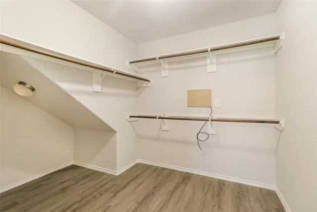 a view of a room with racks on the wall