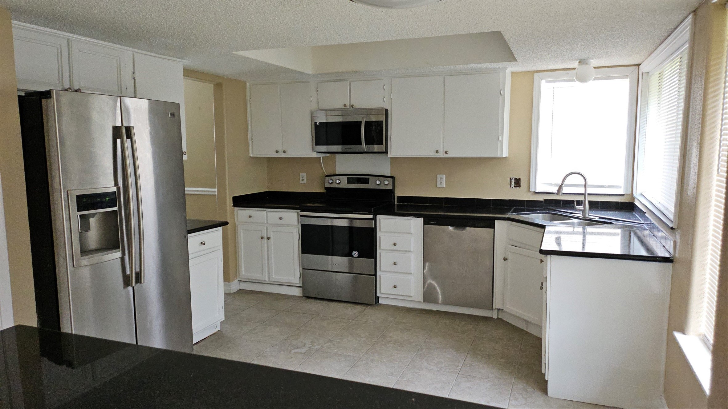 12807 Villawood Lane Houston, TX 77072 - Photo 5 of 14 Upgraded granite kitchen countertop