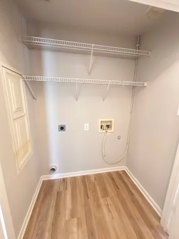 a view of a room with racks on the wall