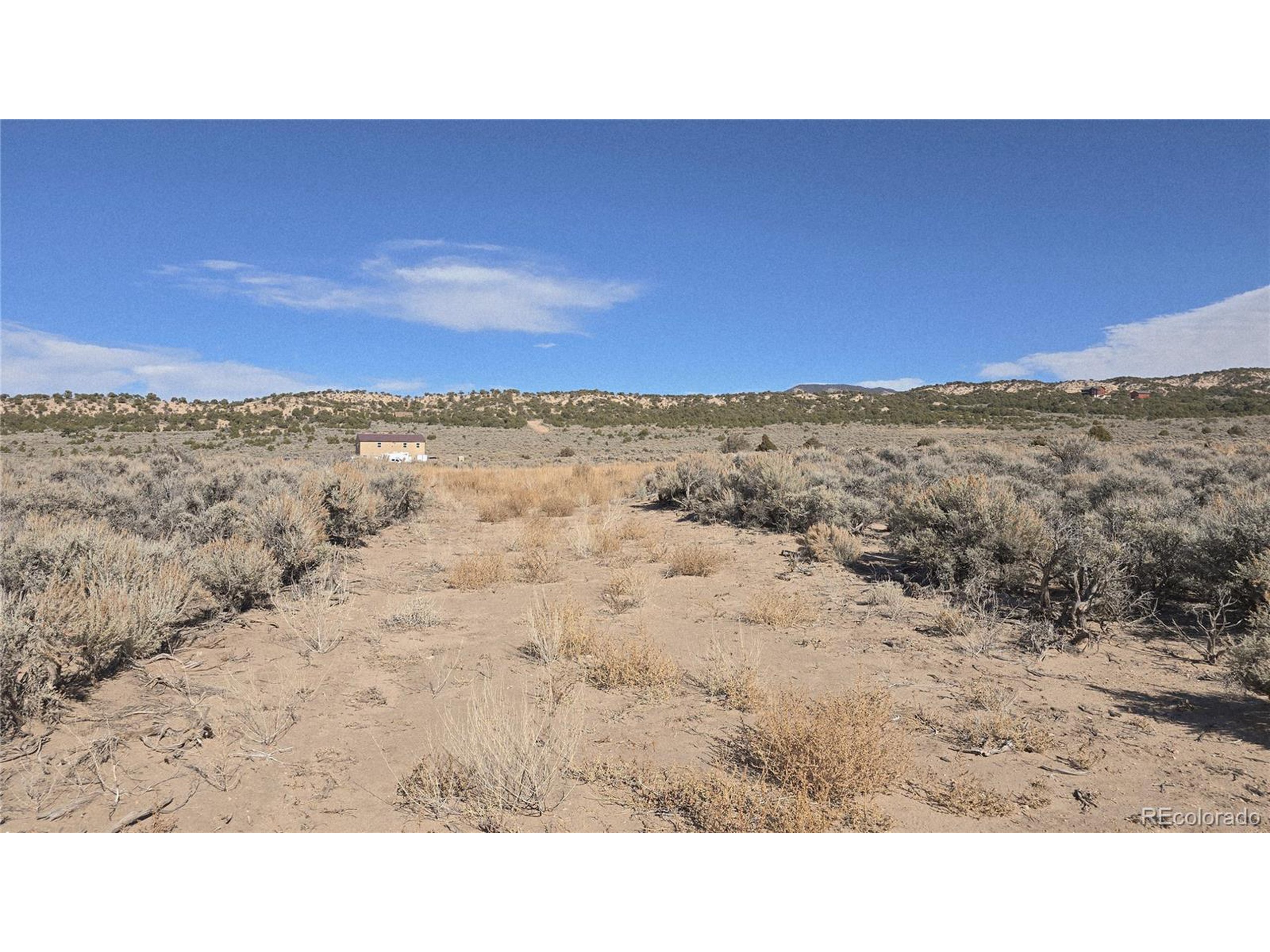 1768 Bateman Road Fort Garland, CO 81133 - Photo 28 of 30 a black and white photo of a road