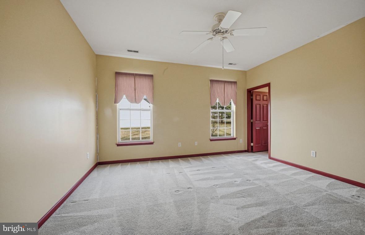 304 Daylilly Way Middletown, DE 19709 - Photo 9 of 20 a view of an empty room with a window
