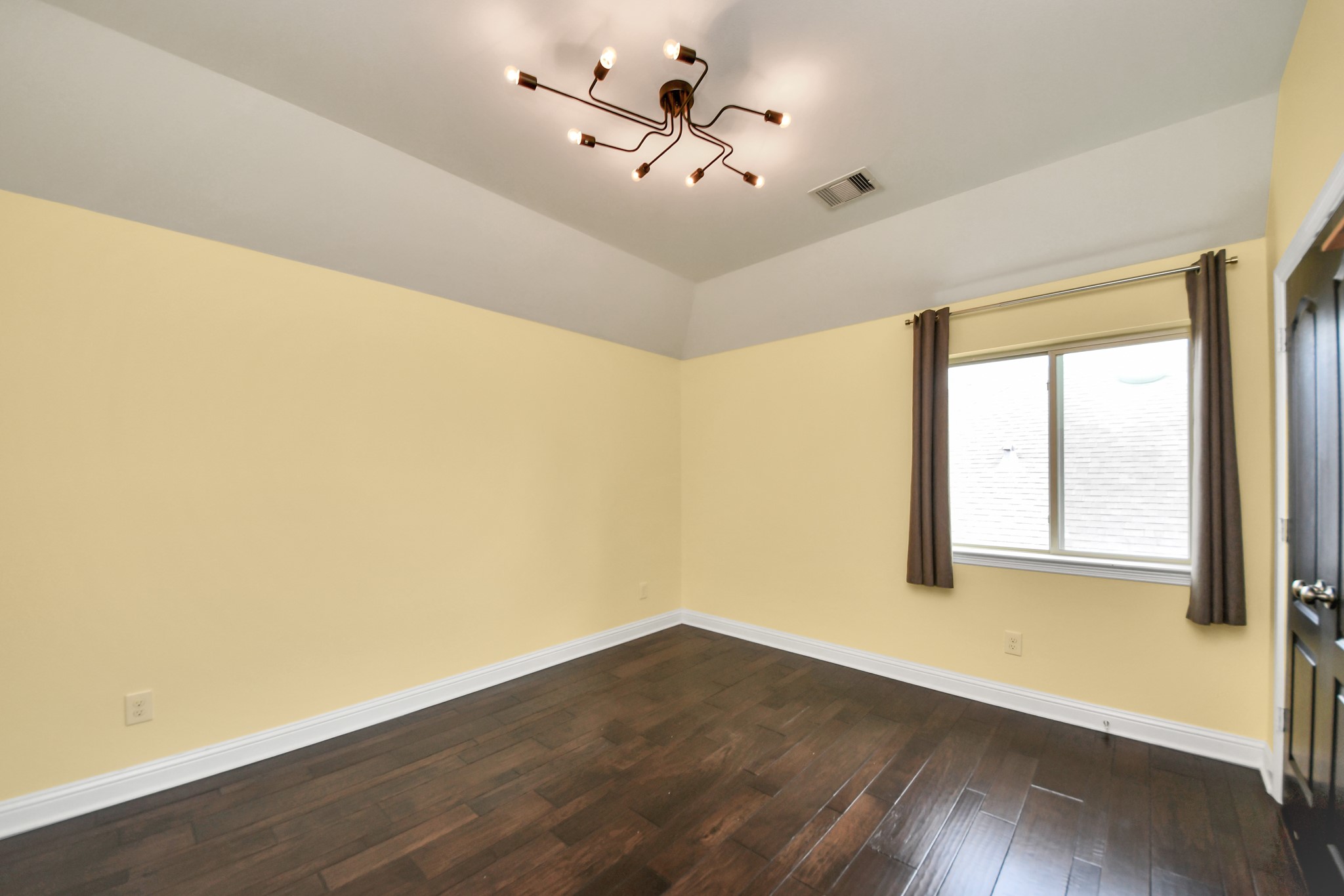 2811 Hadley Springs Lane Spring, TX 77386 - Photo 44 of 50 a view of an empty room with wooden floor and a window