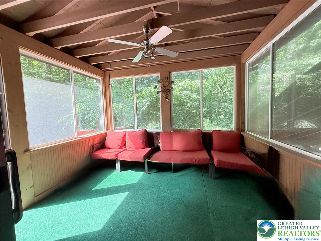 193 Canterbury Road Bushkill, PA 18324 - Photo 15 of 32 a living room with furniture and a large window