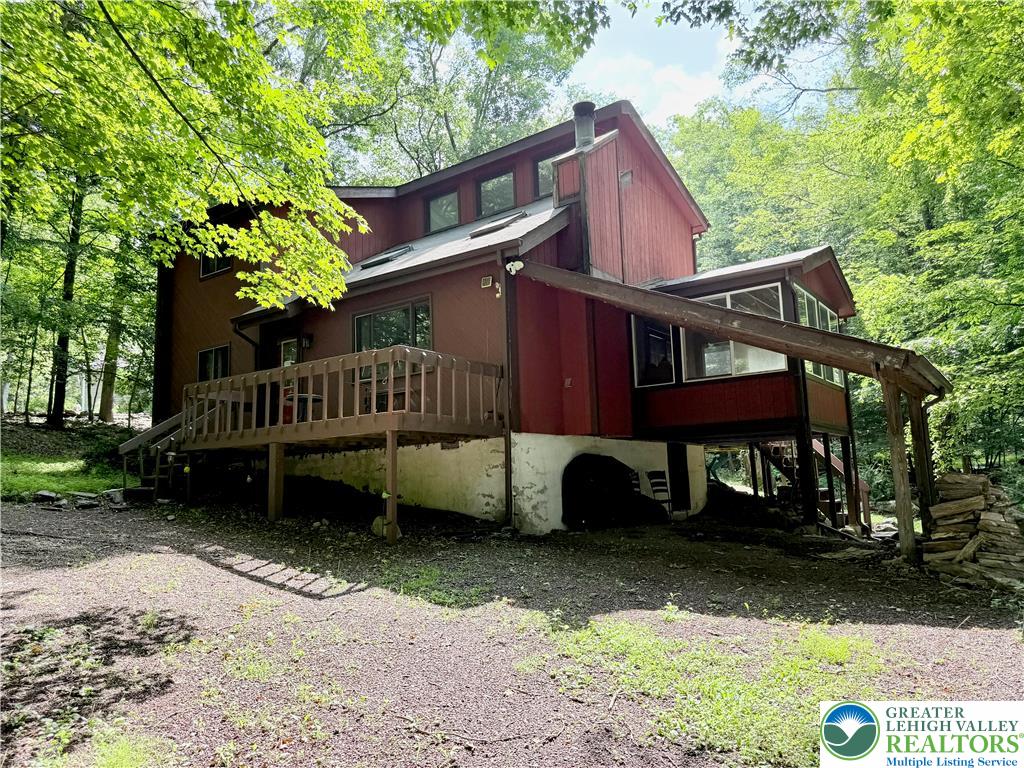 193 Canterbury Road Bushkill, PA 18324 - Photo 17 of 32 a view of a house with a yard