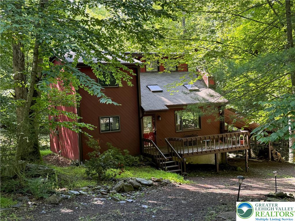 193 Canterbury Road Bushkill, PA 18324 - Photo 2 of 32 a view of a house with a yard