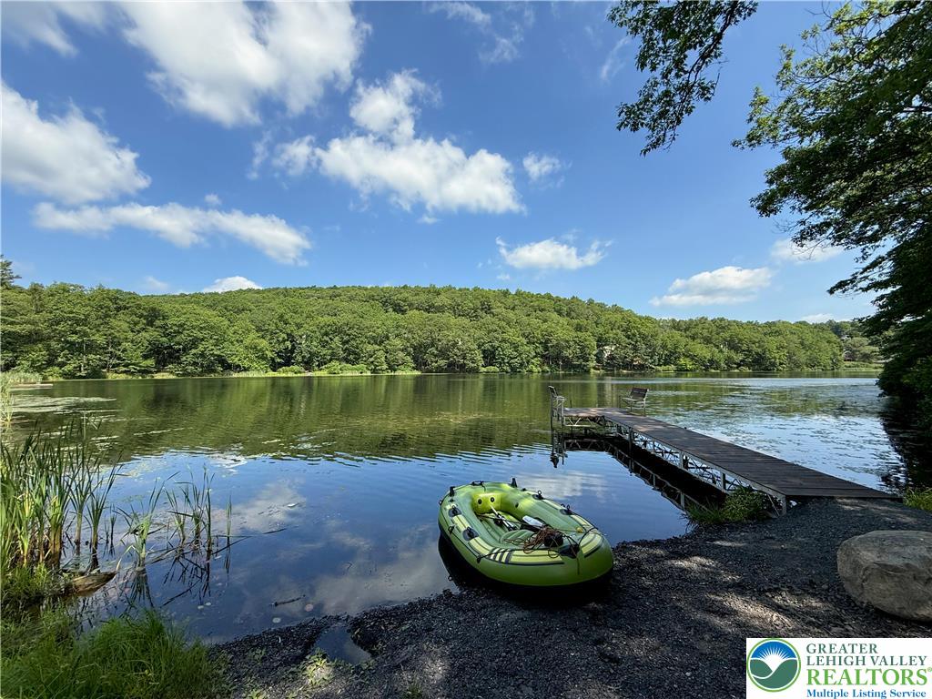 193 Canterbury Road Bushkill, PA 18324 - Photo 25 of 32 a view of a lake with a yard