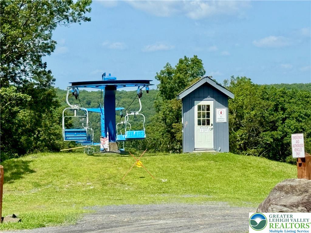 193 Canterbury Road Bushkill, PA 18324 - Photo 31 of 32 a view of a house with backyard and garden