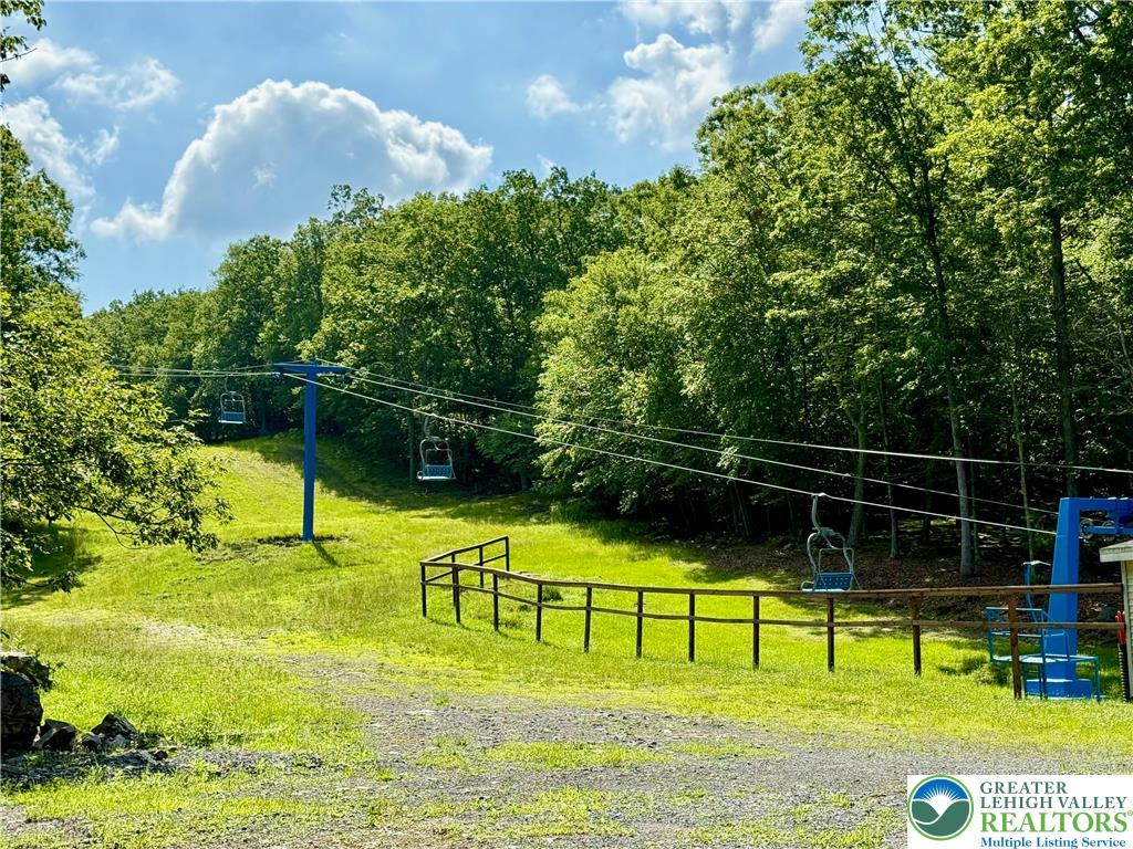 193 Canterbury Road Bushkill, PA 18324 - Photo 32 of 32 a view of swimming pool with a garden