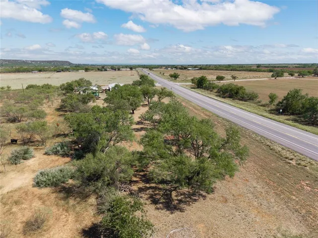 a view of road with trees
