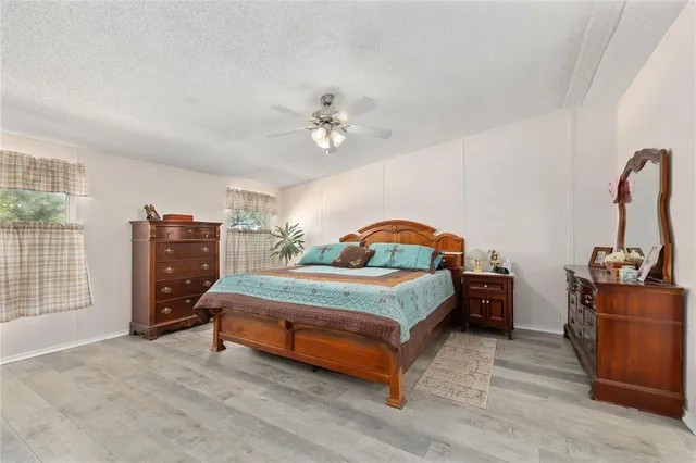 a bedroom with a bed and furniture